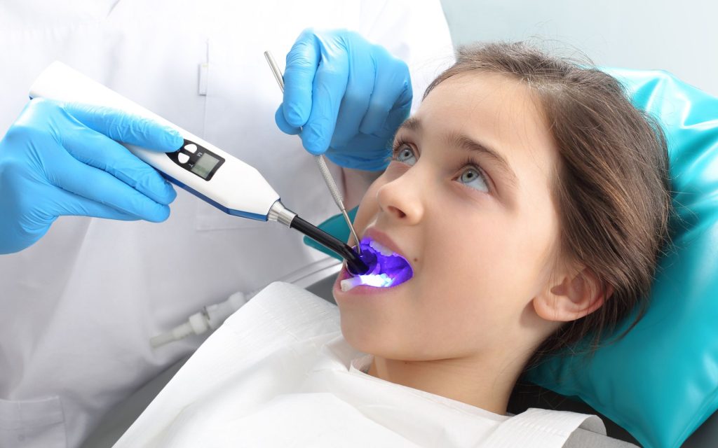 young girl getting dental sealants in San Antonio